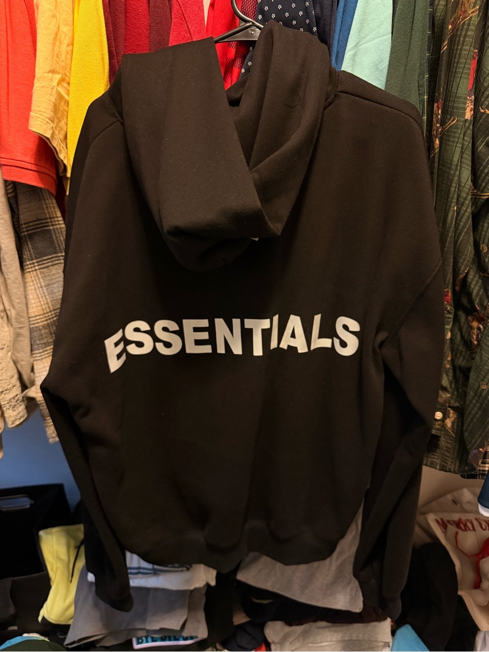 Essentials Black Hoodie with Bold White Logo